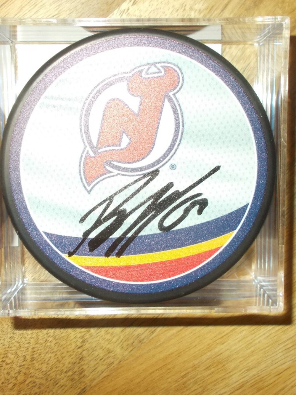 Jesper Bratt Signed Reverse Retro NJ Devils NHL Hockey Puck AUTHENTICATED